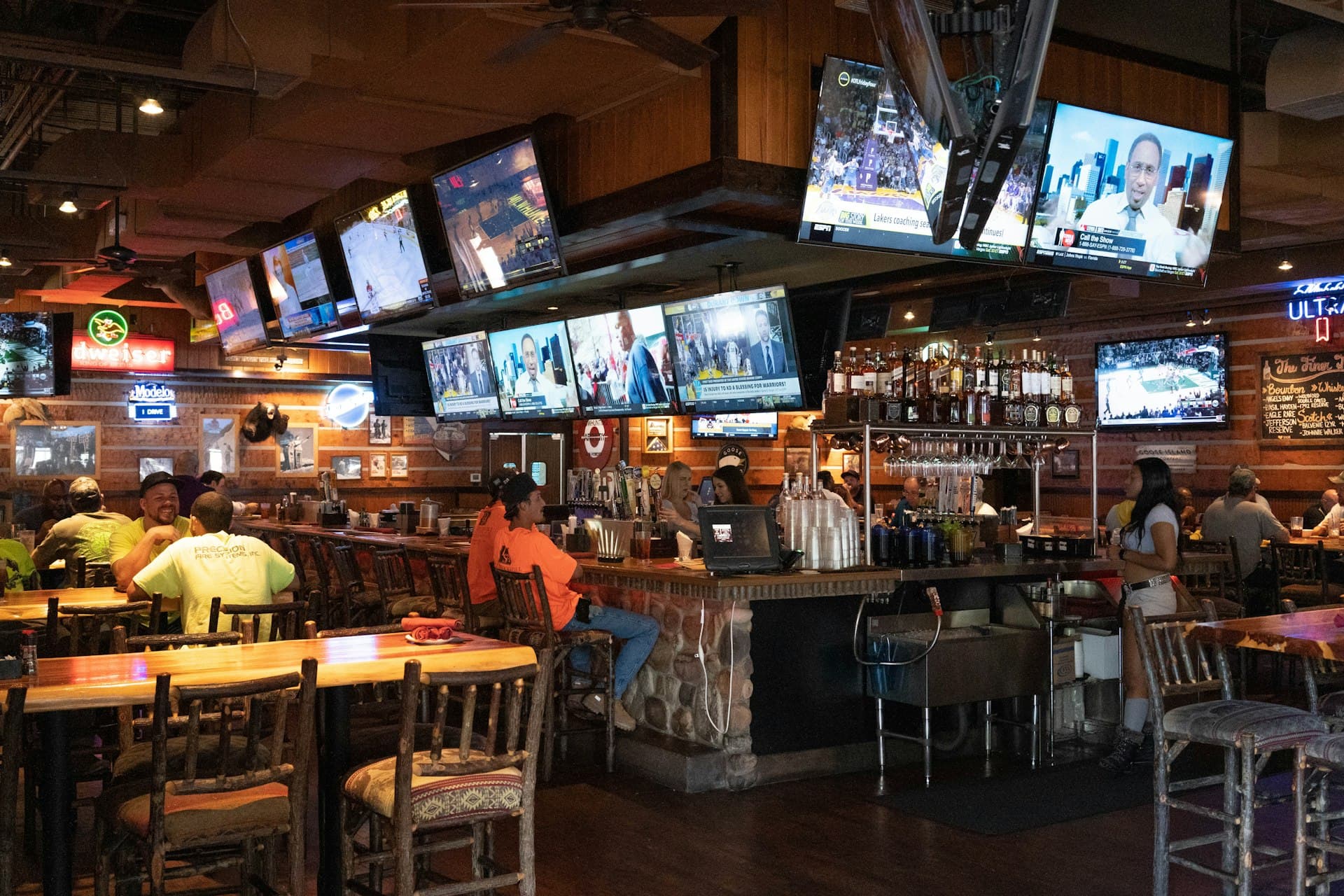 Bar with TV screens above the counter